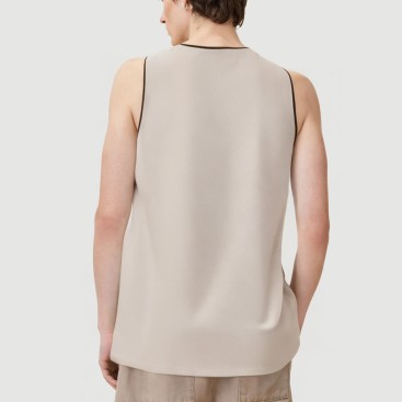 Vest with embossed print and embroidered beads
