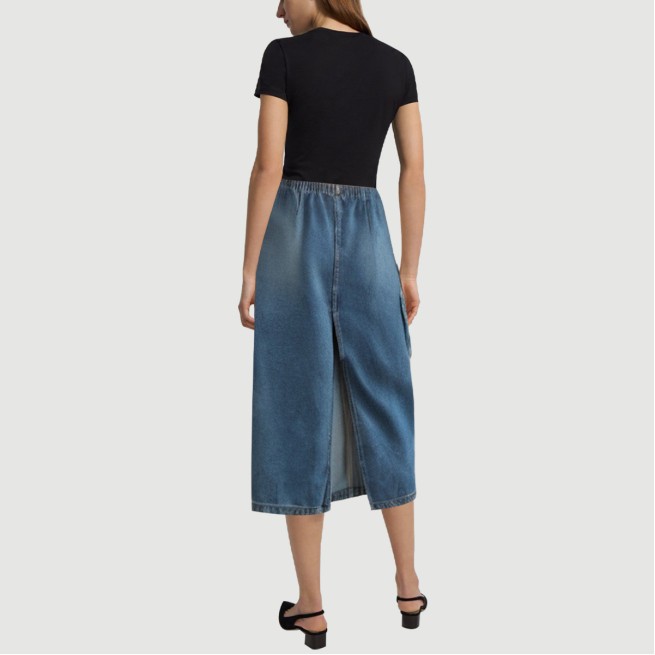 Denim blue calf-length skirt with front pockets